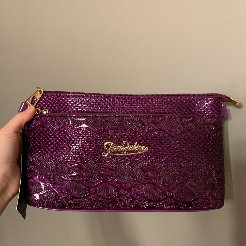 Purple crossbody alligator print bag